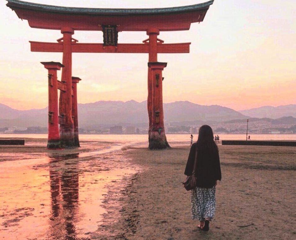 best places to visit in japan Itsukushima Shrine @misstaolin - Amazing places to visit in Japan